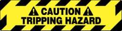 NMC - Caution - Tripping Hazard, Anti-Skid Pressure-Sensitive Vinyl Floor Sign - Rectangle, Black on Yellow, Adhesive Backed, For Accident Prevention - Americas Industrial Supply