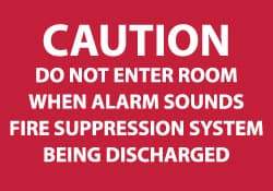 NMC - Caution - Do Not Enter Room When Alarm Sounds - Fire Suppression System Being Discharged, Plastic Fire Sign - 10" Wide x 7" High - Americas Industrial Supply