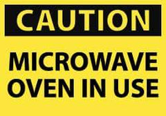 NMC - Accident Prevention Label, Header: CAUTION - Legend: Caution - Microwave Oven in Use, English, Black & Yellow, 5" Long x 3" High, Sign Muscle Finish - Americas Industrial Supply