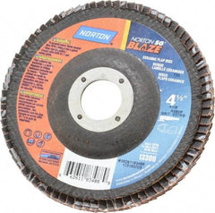 Norton - 60 Grit, 4-1/2" Disc Diam, 7/8" Center Hole, Type 29 Ceramic Flap Disc - 13,000 Max RPM, Fiberglass Backing, Arbor Attaching System, Coated - Americas Industrial Supply