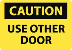 NMC - Caution - Use Other Door, Aluminum Fire and Exit Sign - 14" Wide x 10" High - Americas Industrial Supply